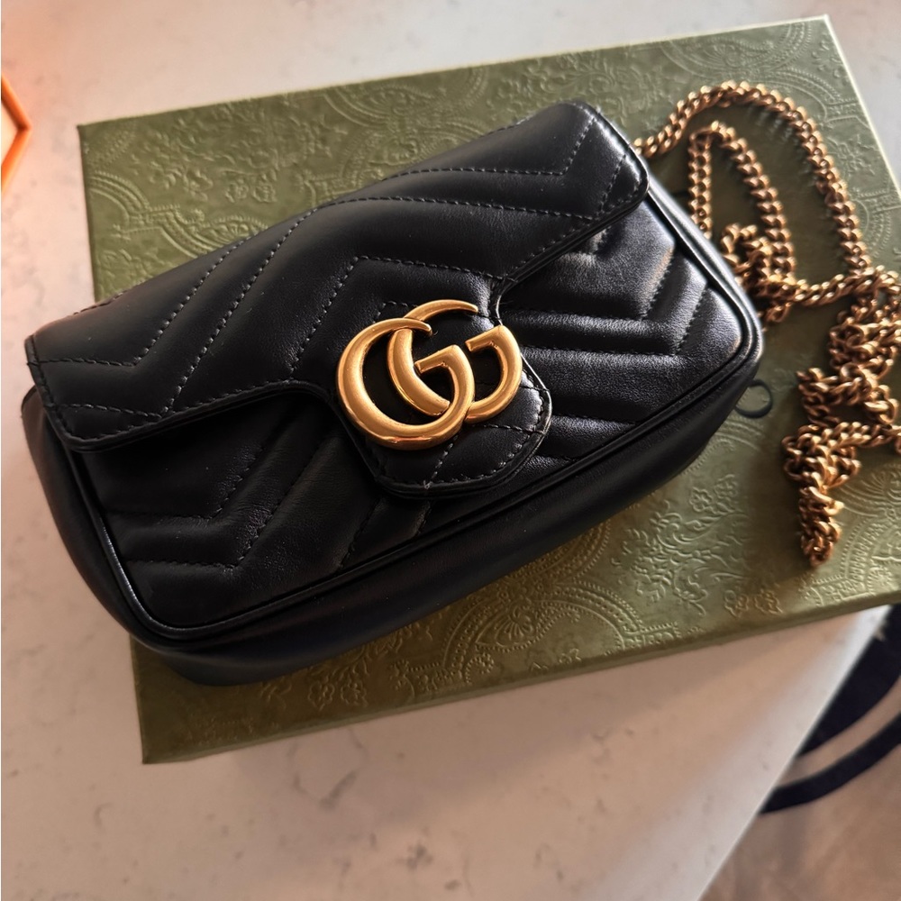 Gucci marmont super mini in black.
